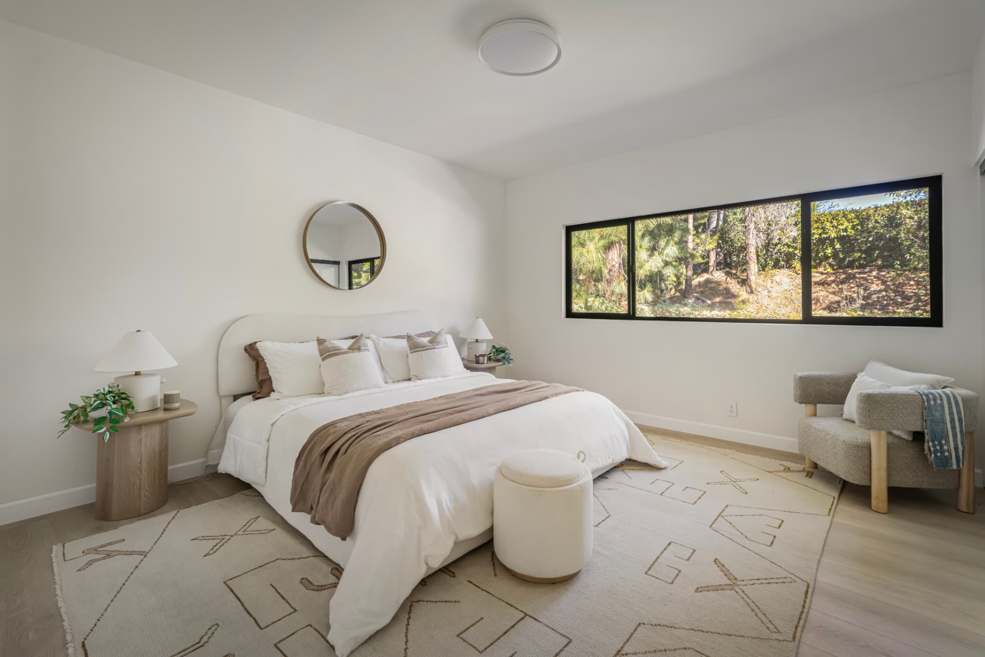 Bedroom with clerestory window looking into the trees